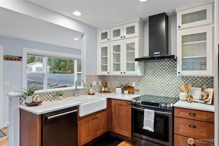 Gorgeous kitchen with farm sink overlooking the garden area