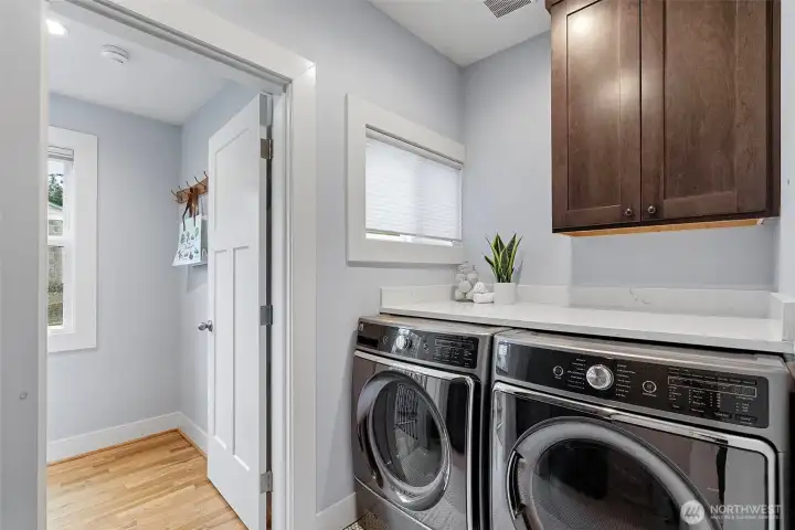 Laundry room down the hall from the bedrooms and bathroom