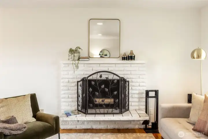 Nice fireplace. Fresh paint, and hardwood floors.
