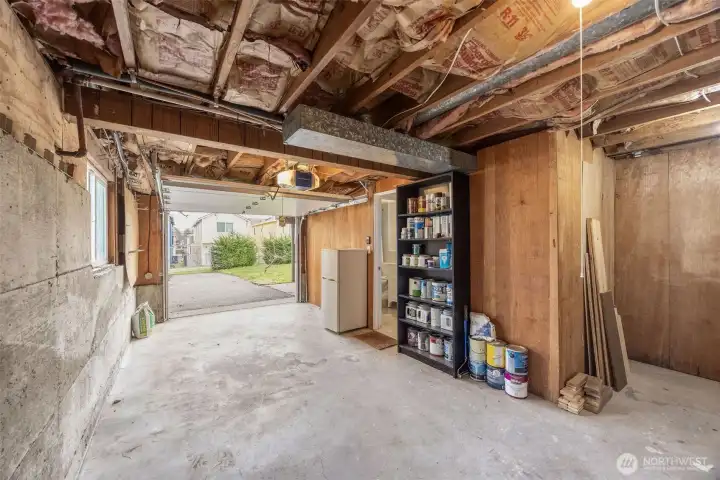 Garage access is off the alley; with additional parking options on the driveway.