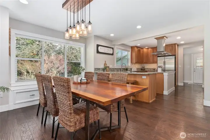 Spacious kitchen with seamless flow into dining area.