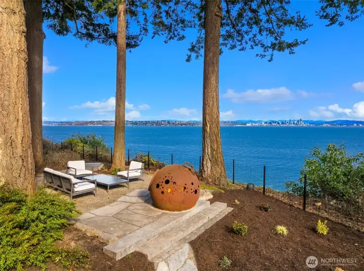 Beck waterfront patio with custom wood burning fireplace