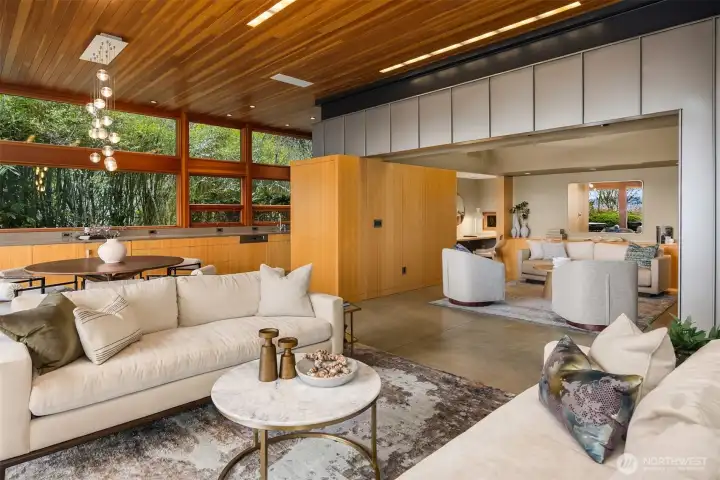 Main house living and family room with folding doors for privacy