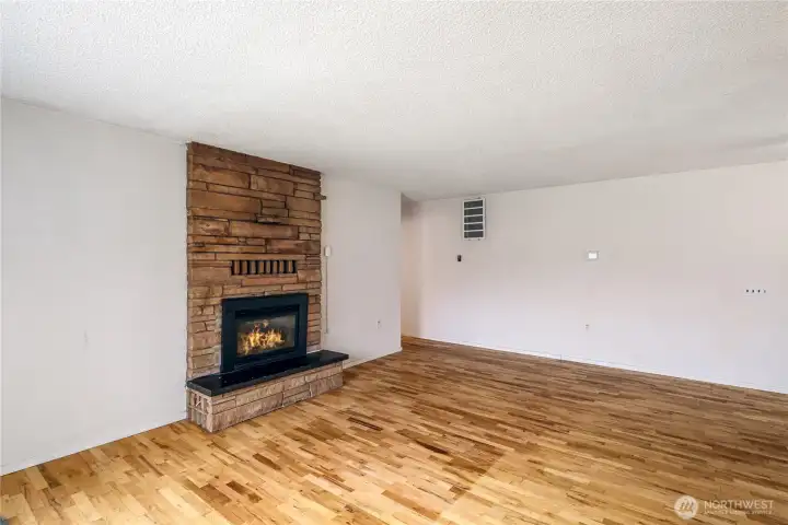 Living room has a propane fireplace for those cool evenings. Living room has a propane fireplace for those cool evenings.