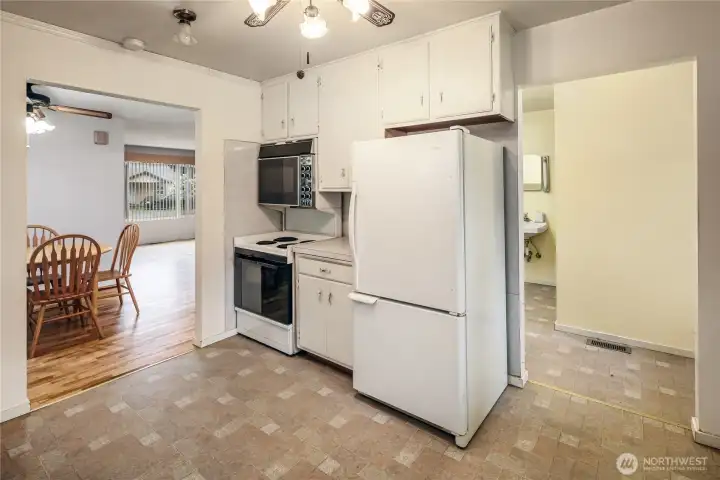 The kitchen has plenty of cabinets, stove, refrigerator and dishwasher. The kitchen has plenty of cabinets, stove, refrigerator and dishwasher.