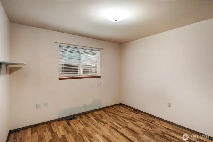 Bedroom 1 has hardwood flooring and large wood closets. Bedroom 1 has hardwood flooring and large wood closets.