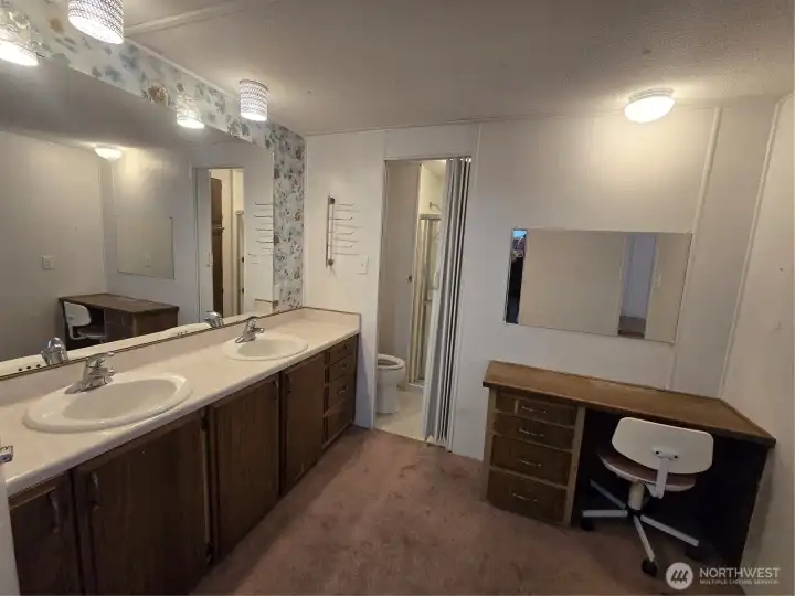 Primary Vanity with attached 3/4 shower