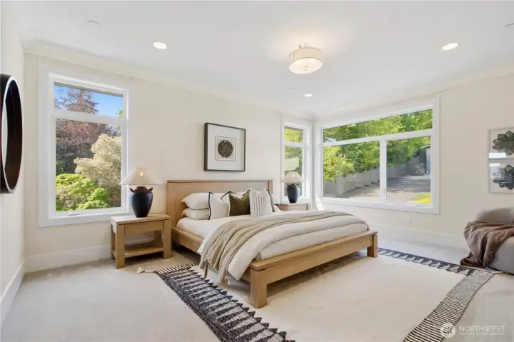 Welcoming view into the primary bedroom, offering a glimpse of the serene and spacious retreat beyond
