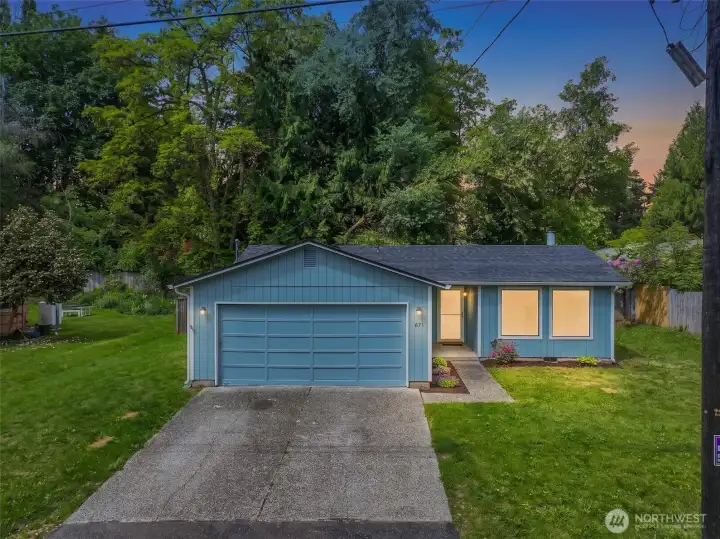 Beautiful twilight photo of the front of the home.