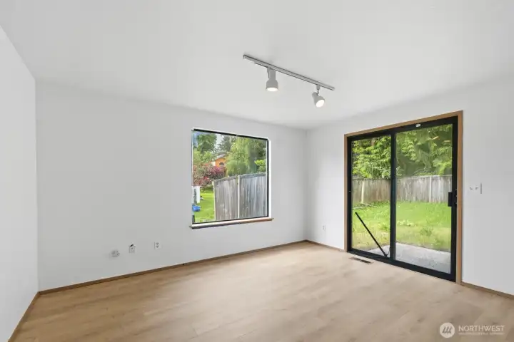 Dining/Family room offers new LVP flooring that is open to the kitchen.