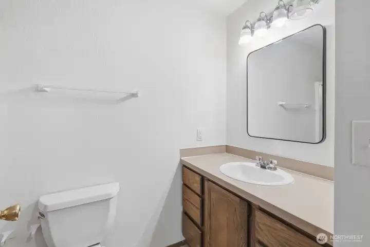 Hall bath is just across from the first bedroom