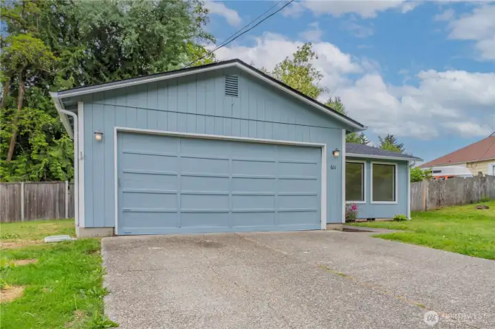 2 car garage and plenty of parking in the driveway