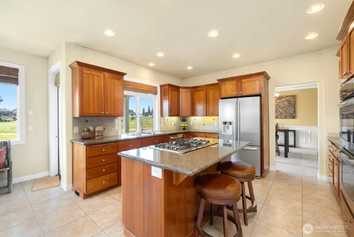 Door to patio from kitchen area makes outdoor dining and entertaining easy.