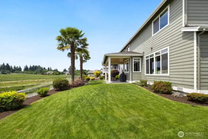 Back yard backs up to unbuildable land to insure privacy and beautiful views!