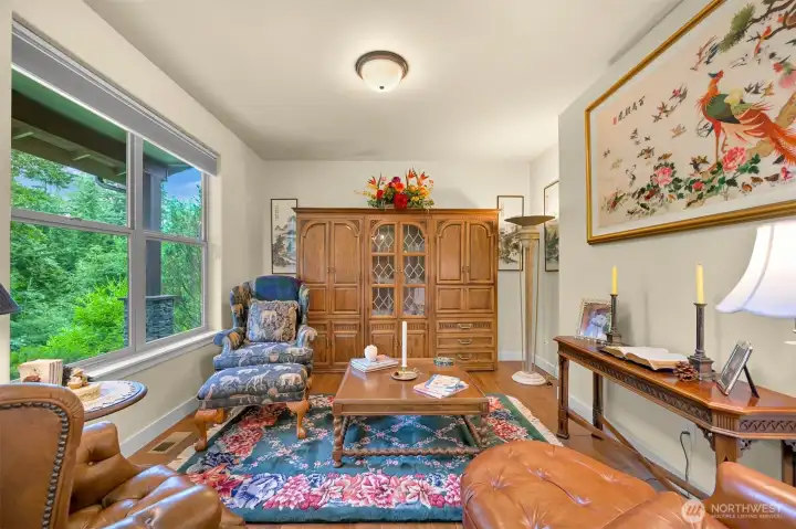 Living / sitting room. This room could be enclosed as a home office.