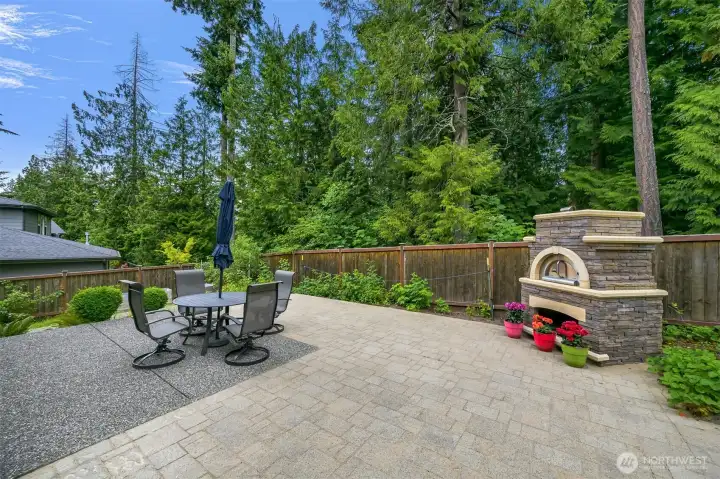 Oversized patio is very private, backing to a wooded greenbelt with creek