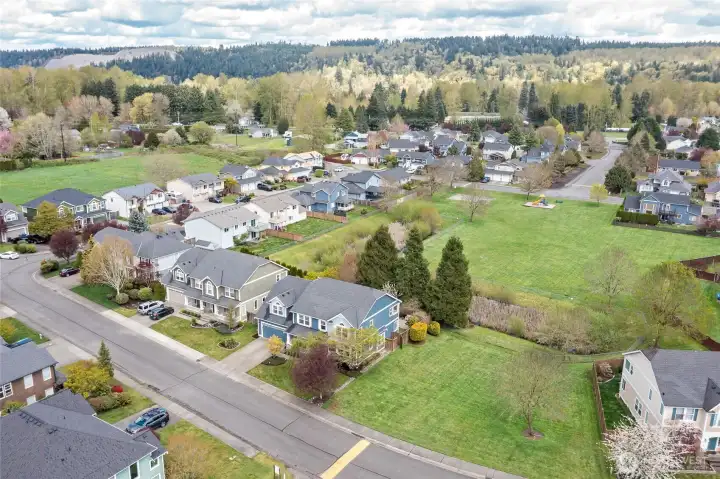 The huge park wraps around the home on 2 sides