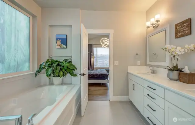 Soaker tub and dual vanity