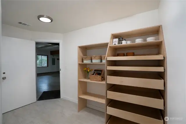 The drawers pull out in this pantry to easily grab whatever you need