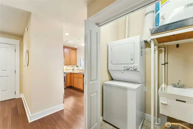 In unit full capacity washer & dryer with utility sink.