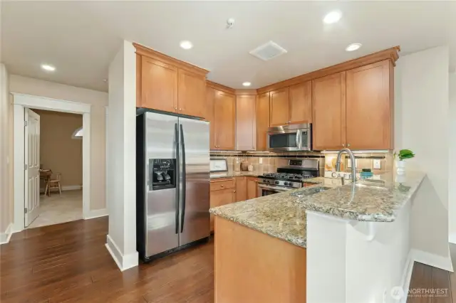 There is an easy flow from the kitchen to the open concept dining and living room.