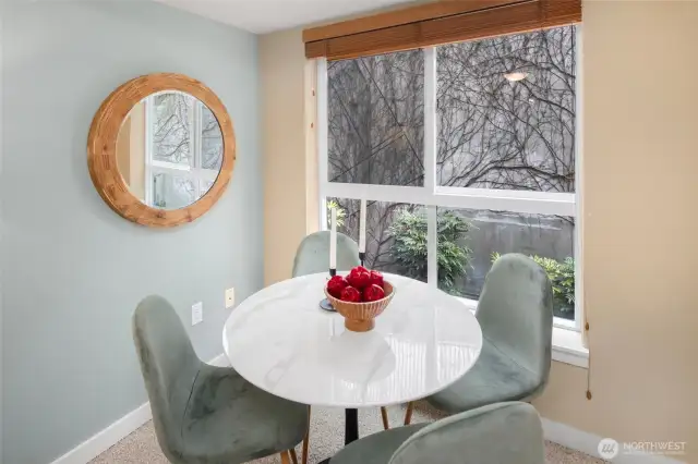 The sweetest little dining nook, complete with a serene garden outlook—your go-to spot for breakfast, journaling, or game night.