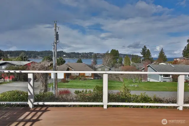 View from your front Trex deck that expands the waterside of your home. You are a short stroll to Freeland Park.