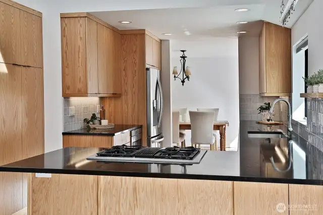 Looking back towards the dining Room. Countertop is spacious enough for stools.