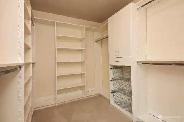 Your walk-in closet has been upgraded with built-ins.
