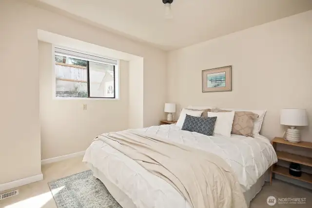 This is the third bedroom and is located at the end of the hall across from the full guest bathroom. The window looks out upon your backyard. There is a standard closet in this room.