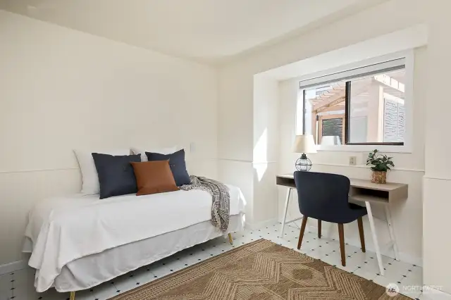 Here is a flex room, adjacent to bedroom #3, also with a standard sized closet. Previous owner had her washer & dryer in the closet and Sellers had the washer & dryer moved into the hallway closet. You can glimpse the pergola through the window here.