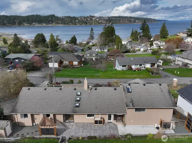 From above. Your private landscaped backyard has a new patio, retaining wall,pergola & fence. Privacy screens as well.