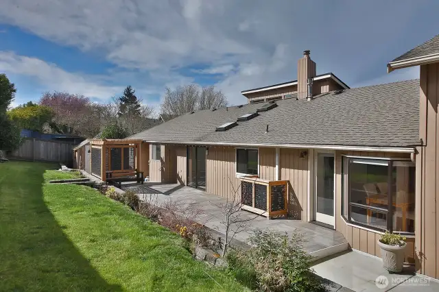 Another perspective of your fenced backyard. East Harbor Rd (25 MPH) runs along the backside of your home. Sellers installed a new fence during their ownership.