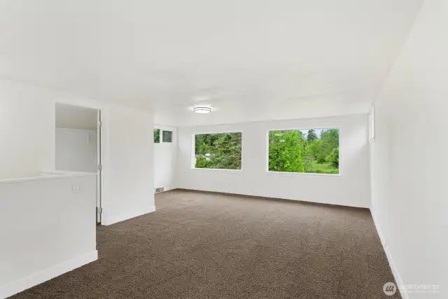 Bedroom #4 upstairs with large picture windows