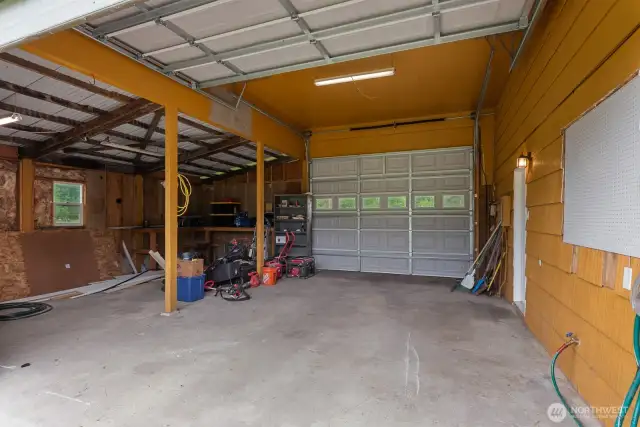 26x24 shop w/220v, double drive through doors, and work bench