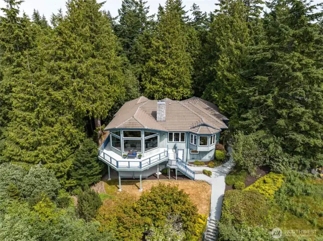 Custom craftsmanship meets natural beauty in this stunning coastal home.