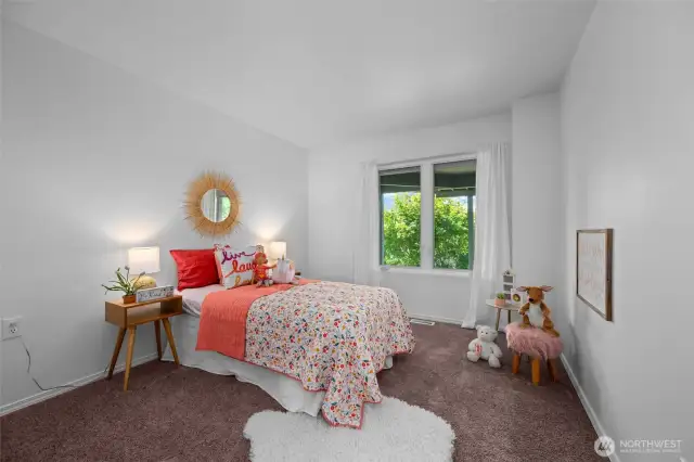 One of two bedrooms in this inviting lower level with private entry- perfect for guests.