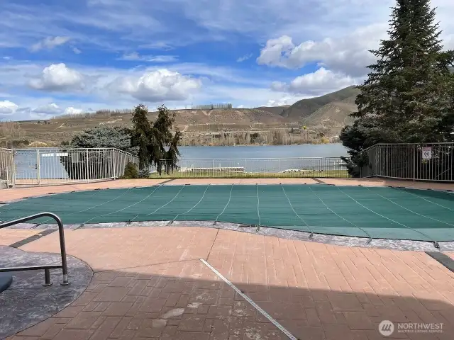 Community Pool with cover on it.
