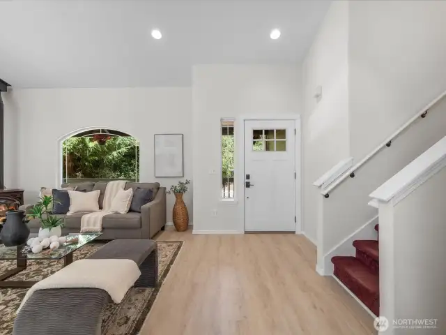 A brand-new front door offers a warm welcome and hints at the stylish updates inside.