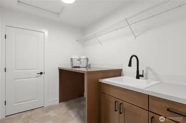Utility Room with tons of storage & counter space + a sink!