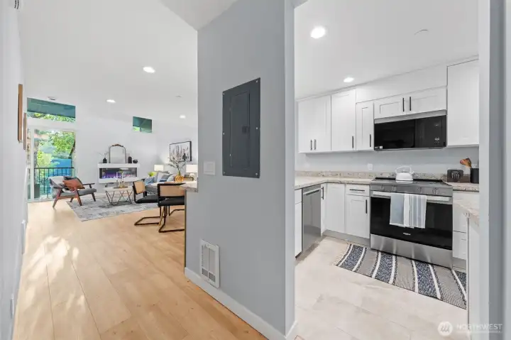 Enter into an open kitchen and living space