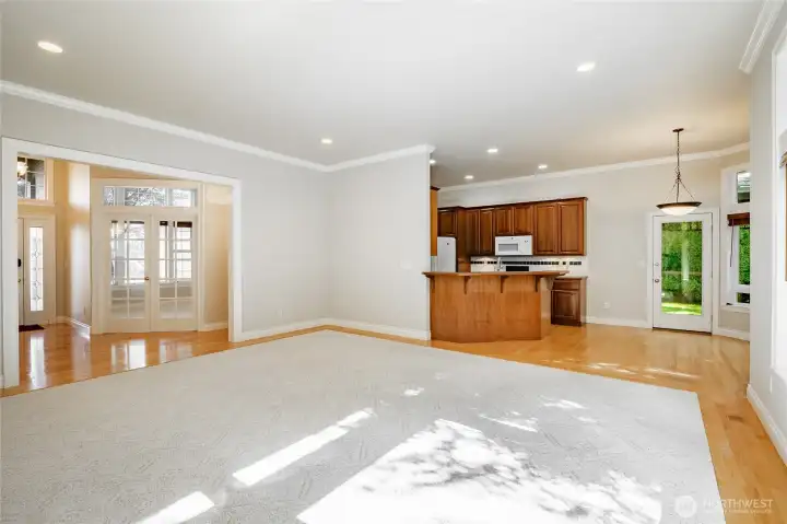 Living room. Entry and Office to the left. Dining area and kitchen to the right. Door to the back yard.