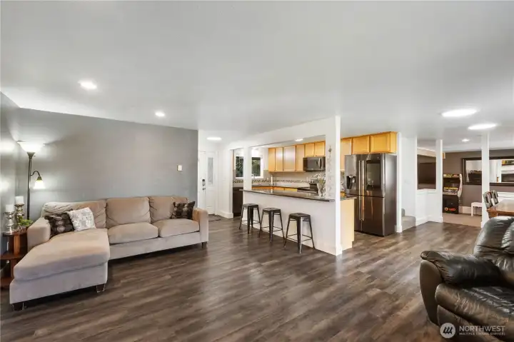 Open floor-plan with kitchen that overlooks living room.