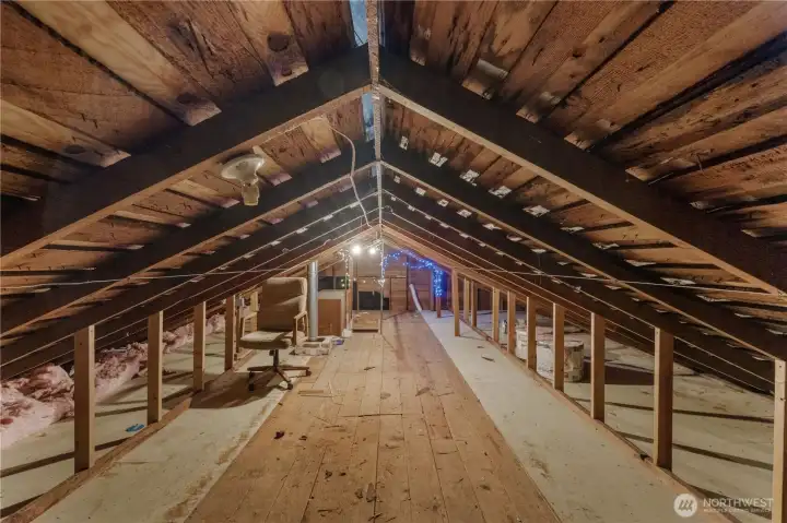 Unfinished attic with plenty of storage