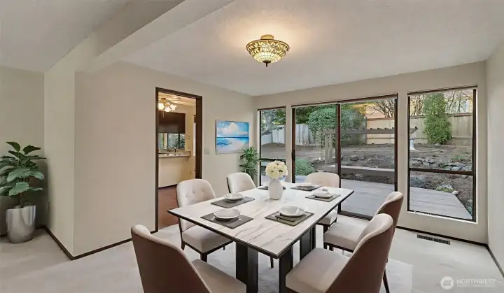 Virtually staged to reflect a warm, connected entertaining space.