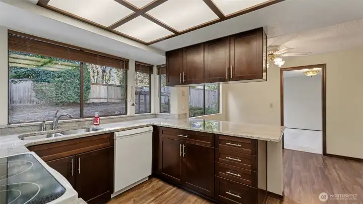 Enjoy backyard views while you prep, cook, and gather.