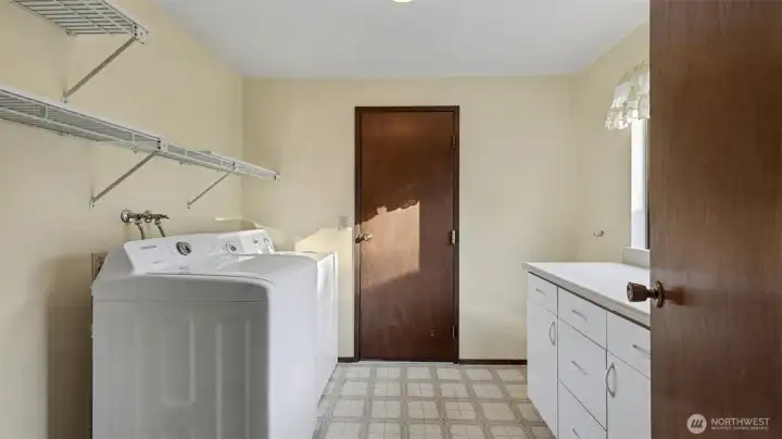 A bright utility room designed to keep life organized.