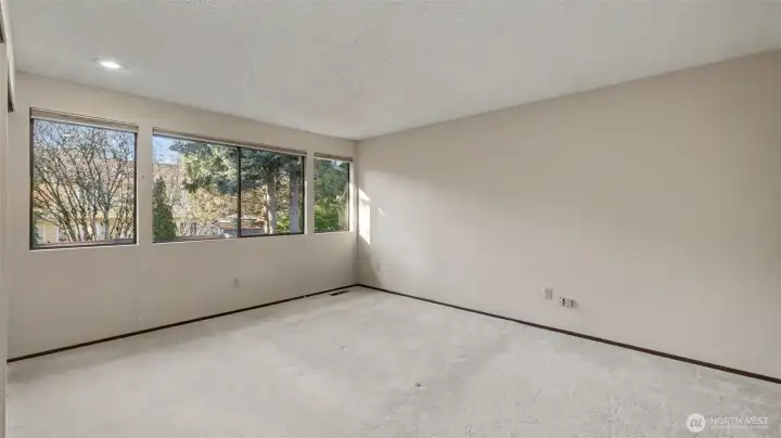 A bright, spacious primary suite with room to unwind and recharge.