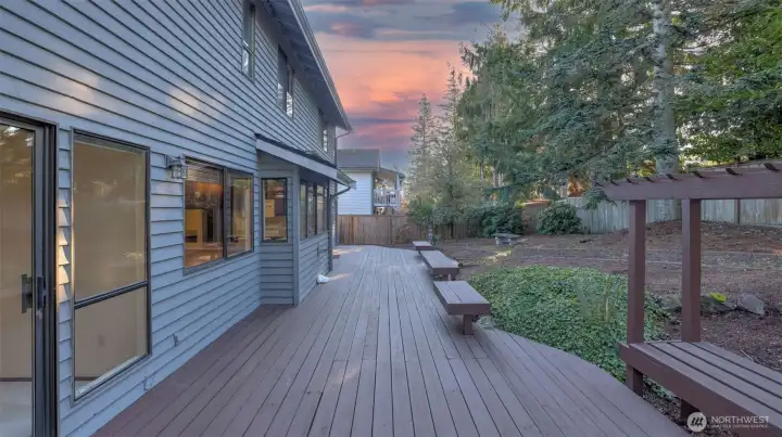 A charming deck walkway connecting indoor comfort to outdoor living.