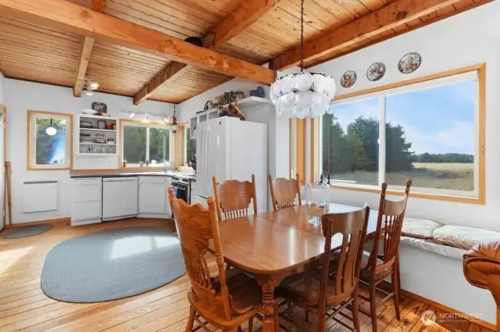 Window seat with a view—enjoy meals overlooking serene dunes and jaw-dropping sunsets.